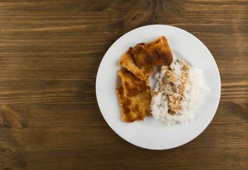 Fish in Breadcrumbs and Rice
