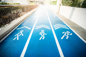 blue concrete runway, walkway and jogging way