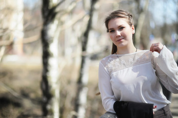 Cute girl in an autumn park