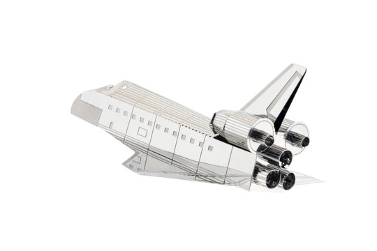 Spaceship / View of toy spaceship on white background.