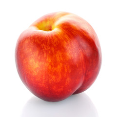 Single red peach fruit isolated on white background.
