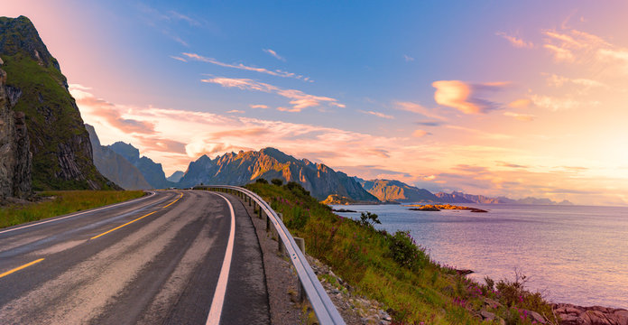 Empty road in Norway, Europe. Sunset travel