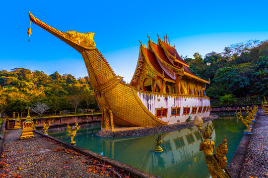 beautiful Suphannahong boat built in the pool at Sancomfu temple Chiang Rai