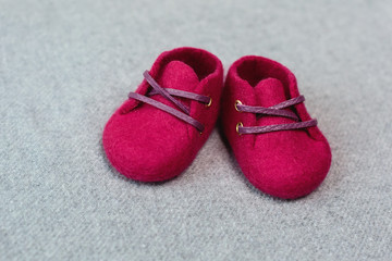 Bordeach shoes handmade from merino wool on a gray background.