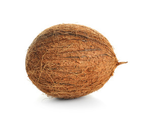 Ripe whole coconut on white background
