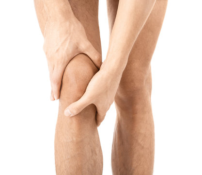 Man Suffering From Knee Pain On White Background