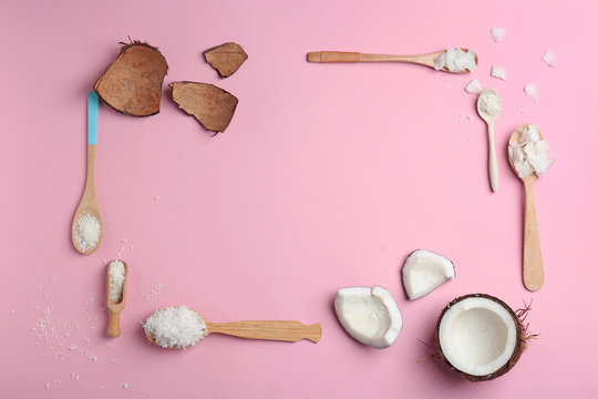 Composition with fresh coconut flakes and spoons on color background, top view