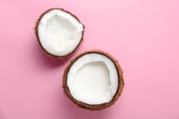 Fototapeta na wymiar Nut with fresh coconut milk on color background