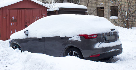 Car covered with snow