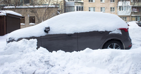 Car covered with snow