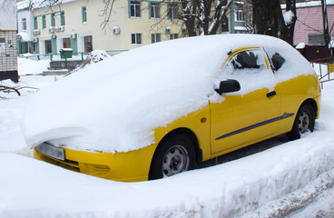Car covered with snow