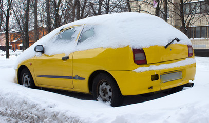 Car covered with snow
