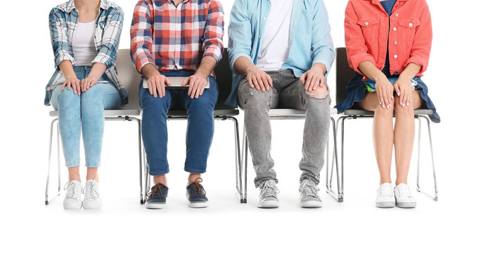 Group of people waiting for job interview on white background