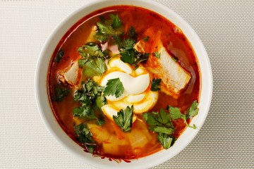 Traditional Ukrainian borscht on a white background