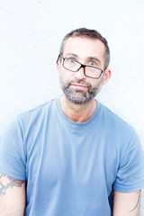  handsome bearded man with crooked eyeglasses