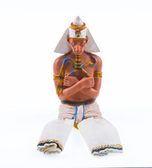 figurine of the pharaoh on a white isolated background