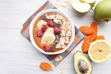 Carrots banana smoothies with apple juice and avocado.