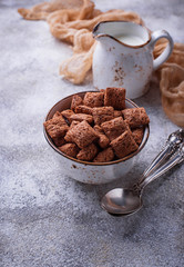 Cocoa puffs corn flakes on light background