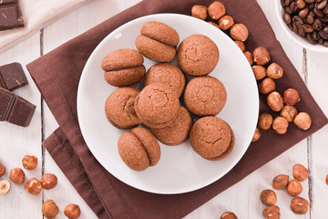 Hazelnut shortbread sandwiches filled with chocolate cream. 
