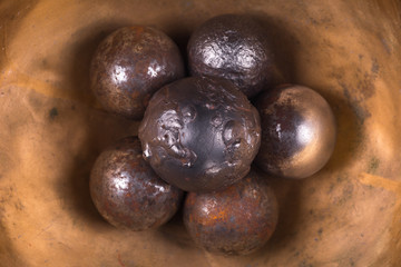 iron balls on a metal surface