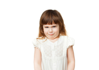 Girl 4-5 years scowls on white background