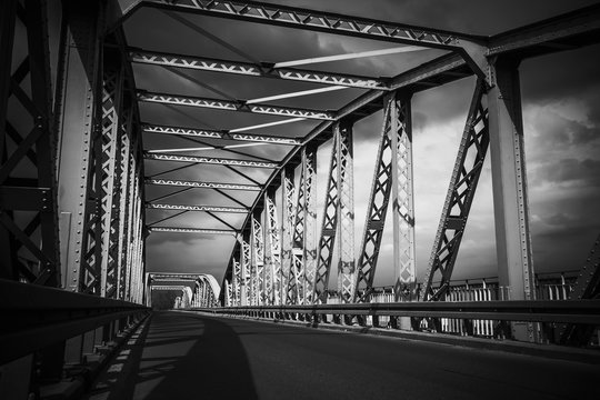 Fototapeta Metal bridge black and white artistic background.