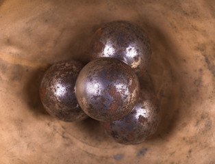 iron balls on a metal surface