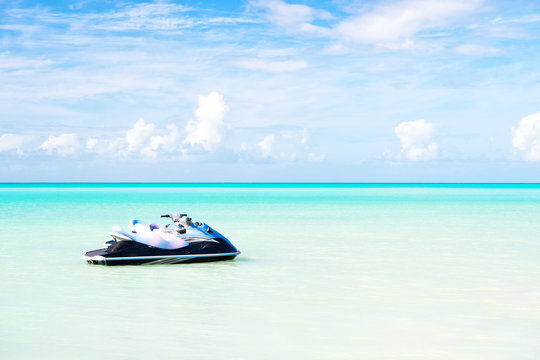 Jet Ski On Turquoise Sea Water In Antigua. Water Transport, Sport, Activity. Speed, Extreme, Adrenaline. Summer Vacation On Caribbean. Wanderlust, Travel, Trip. Adventure, Discovery, Journey