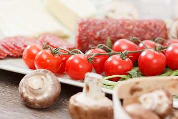 Food ingredients for pizza on table