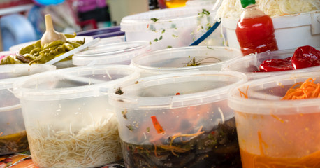 Market stall bazaar offers wide range of spicy and tasty pickles, pepper, tomato, garlic.