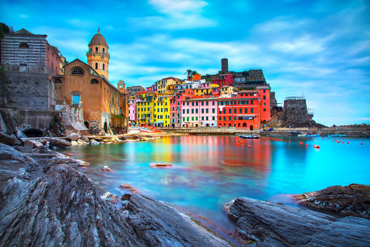 Vernazza village, church, rocks and sea harbor. Cinque Terre, Ligury, Italy