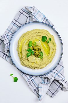 Homemade Aubergine dip with olive oil. Top view. Baba ganoush isolated