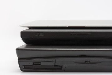 Comparing of laptops, new modern and old laptops, present and past