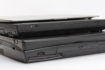 Comparing of laptops, new modern and old laptops, present and past