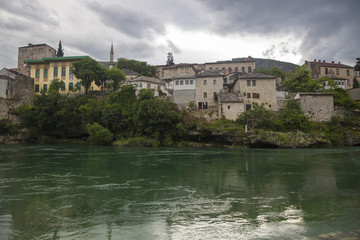 View of Old Town Mostar from the bank of Neretva River, Bosnia and Herzegovina.