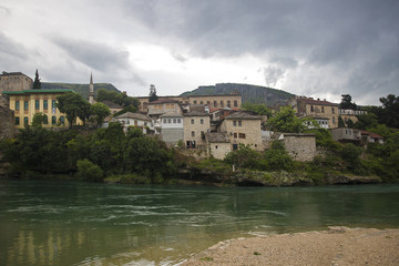 View of Old Town Mostar from the bank of Neretva River, Bosnia and Herzegovina.