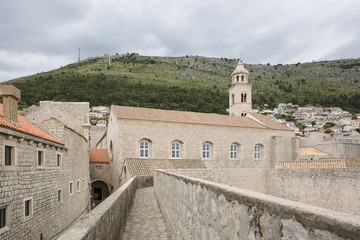 Fototapeta premium walkway path on the old city wall of Dubrovnik, Croatia with view on the cityscape