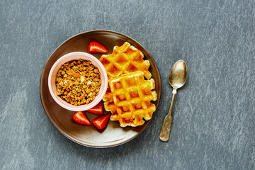 Breakfast with waffles and granola
