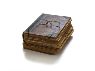 Two old books and glasses.