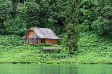 Wooden house in the mountains in Konigssee Lake, Bavaria, Alps, Germany