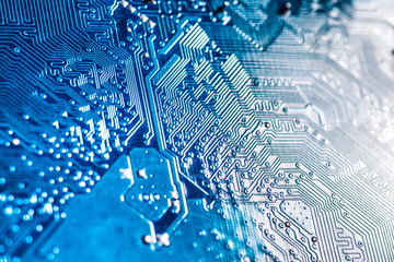 blue circuit board background of computer motherboard