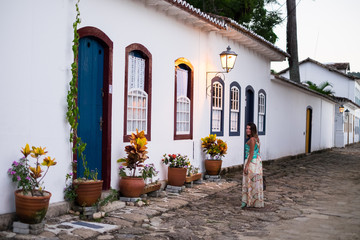 Fototapeta na wymiar Girl historical streets Paraty, Rio de Janeiro, Brazil