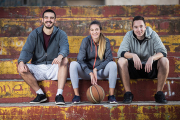 Three basketball players