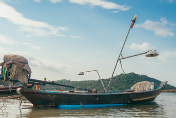 Fototapeta premium Tropical Thai jungle lake Cheo lan wood boat, wild mountains nature national park ship yacht rocks