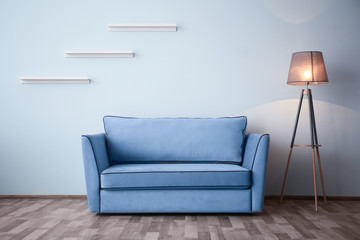 Elegant room interior with comfortable sofa