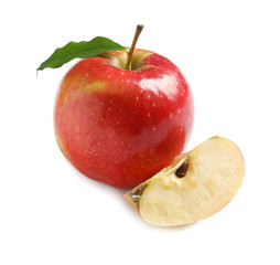 Ripe red apple with slice on white background