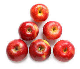 Ripe red apples on white background