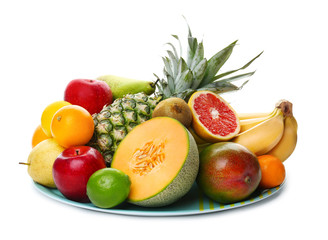 Plate with fresh tropical fruits on white background