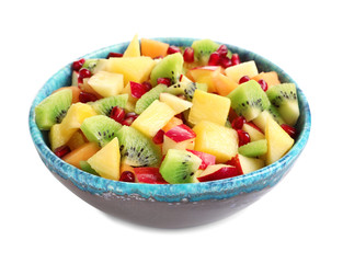 Bowl with fresh cut fruits on white background