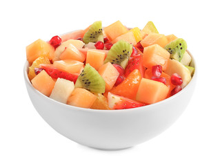 Bowl with fresh cut fruits on white background